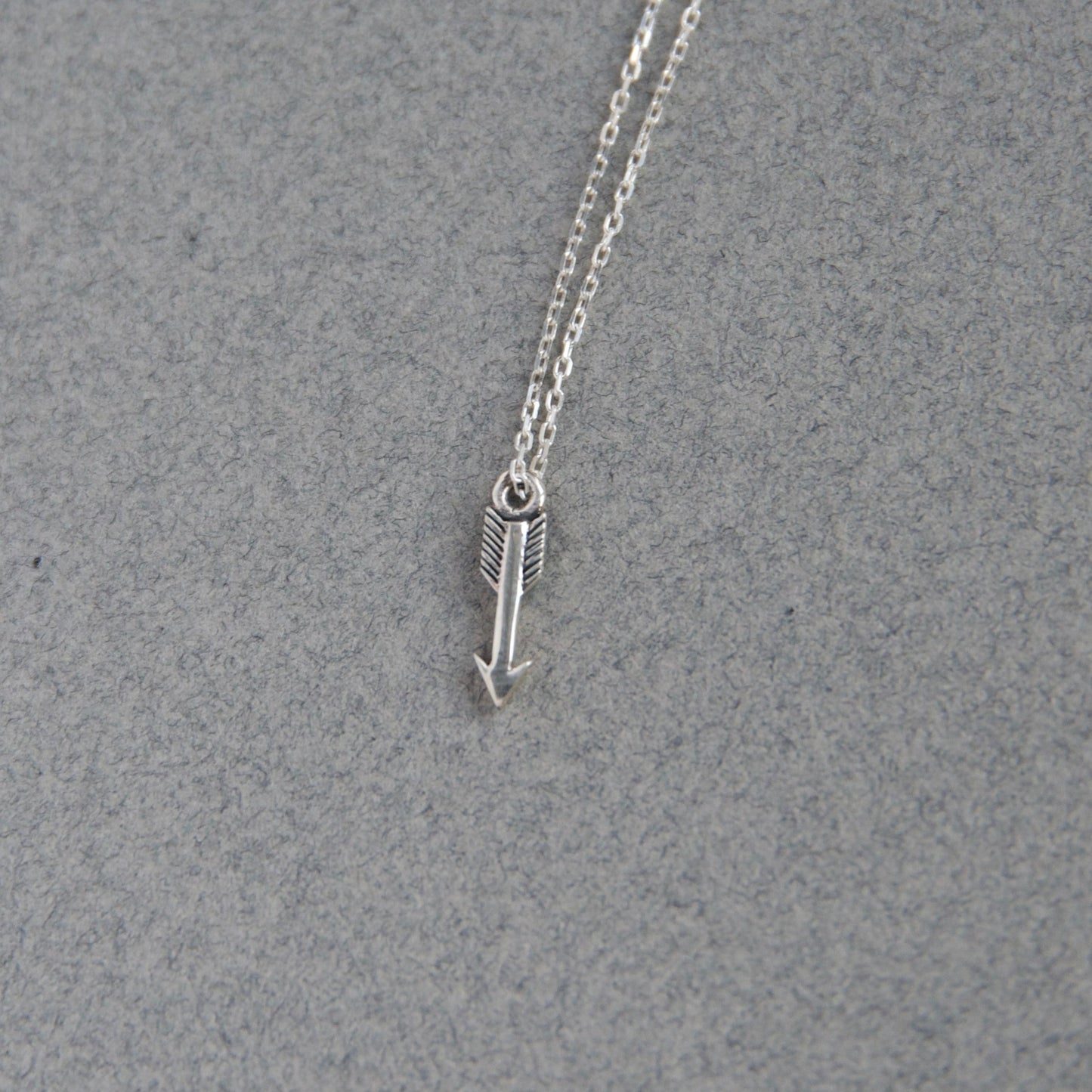 silver arrow charm