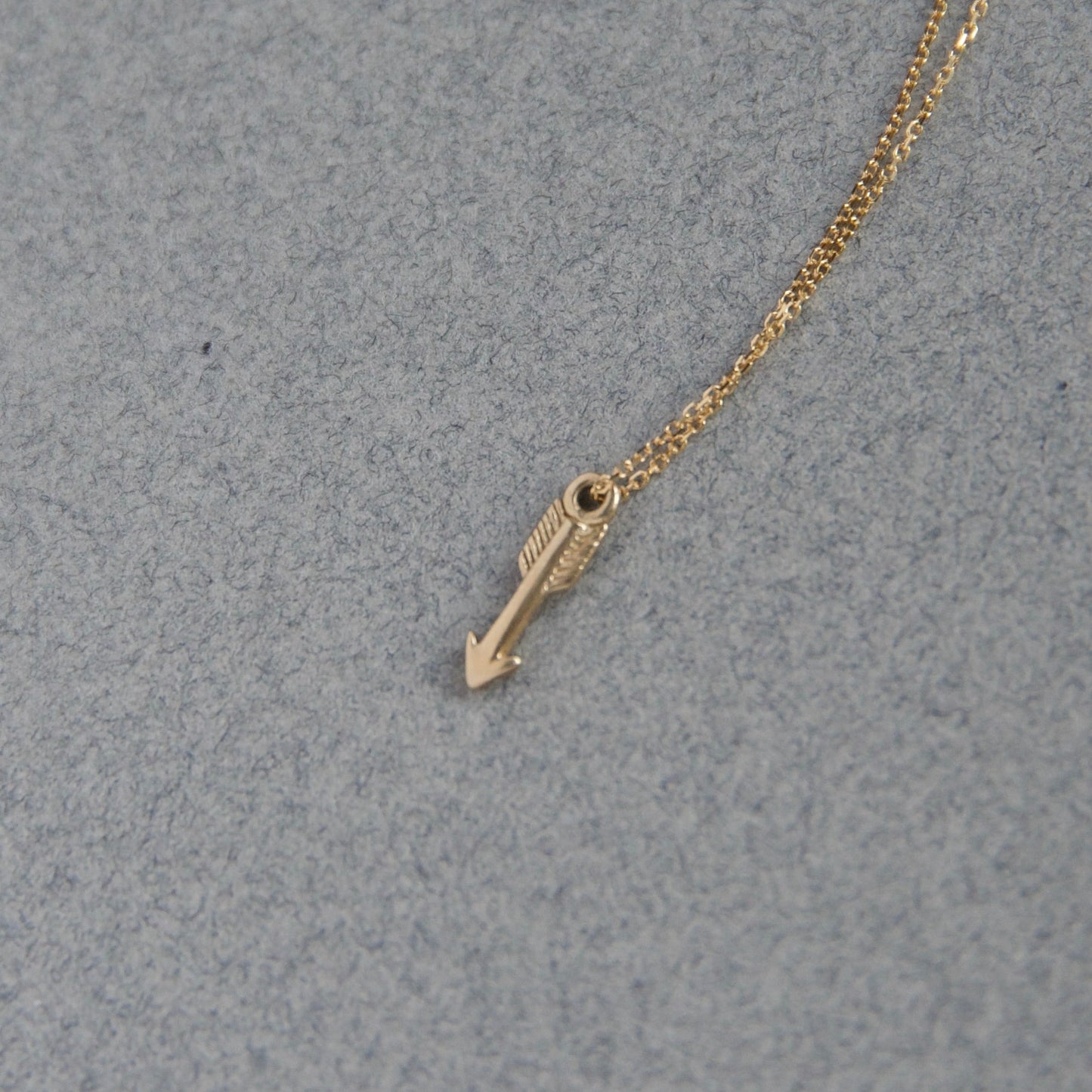 gold arrow charm