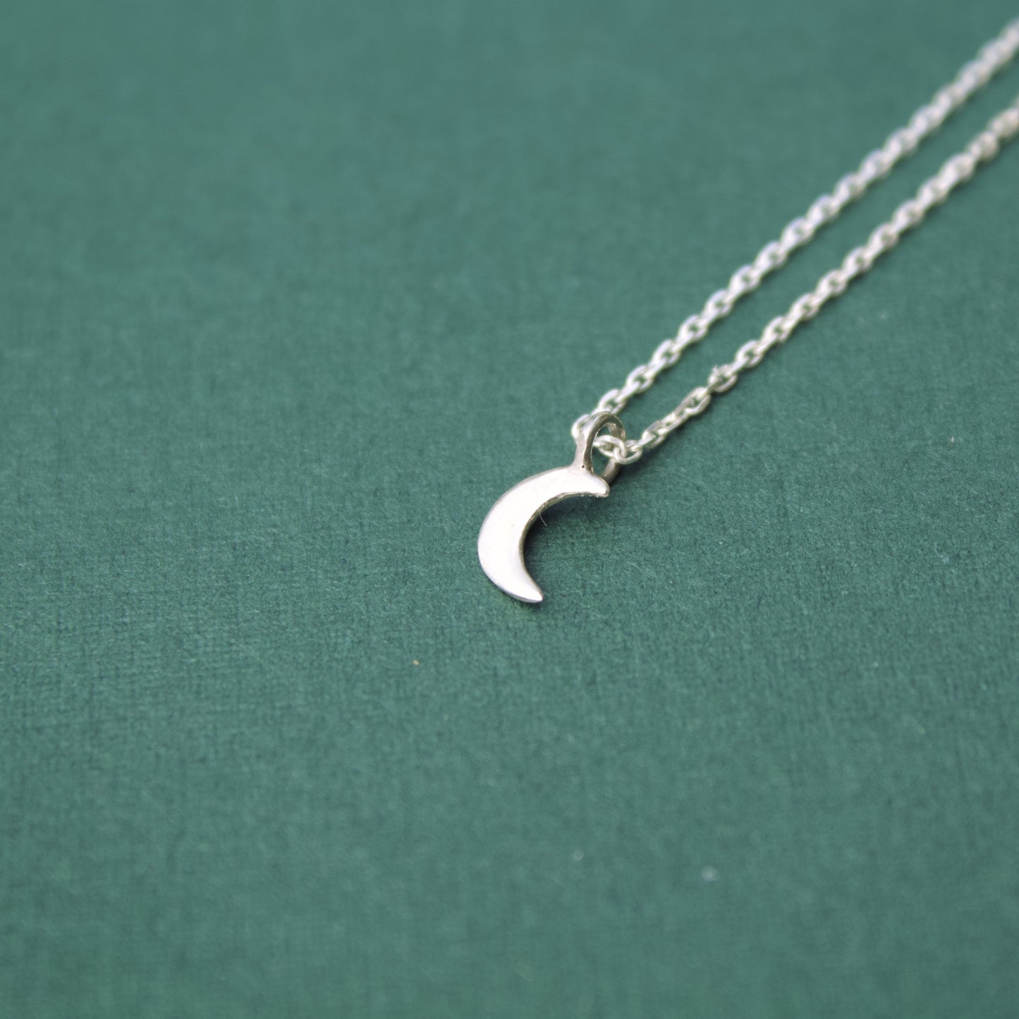 tiny moon charm