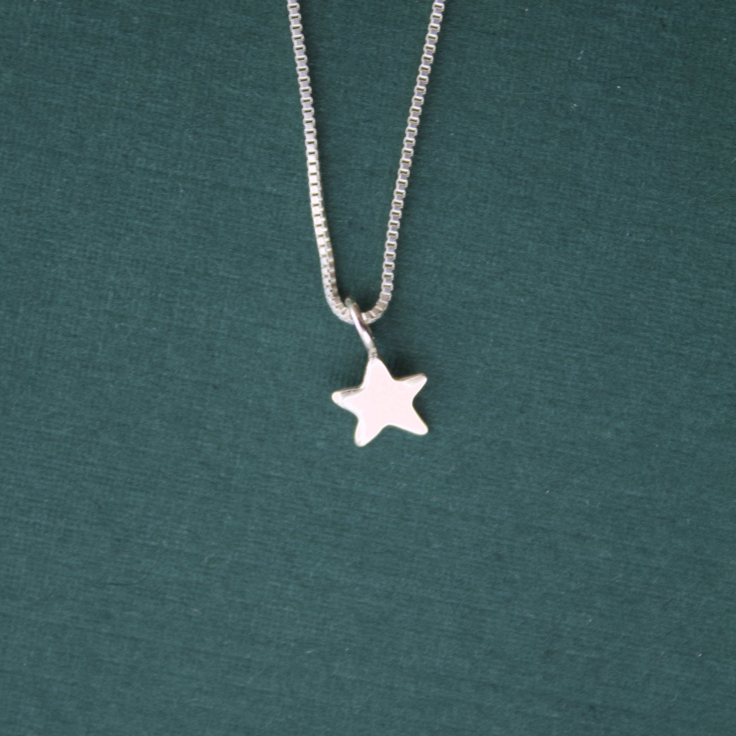 tiny star charm