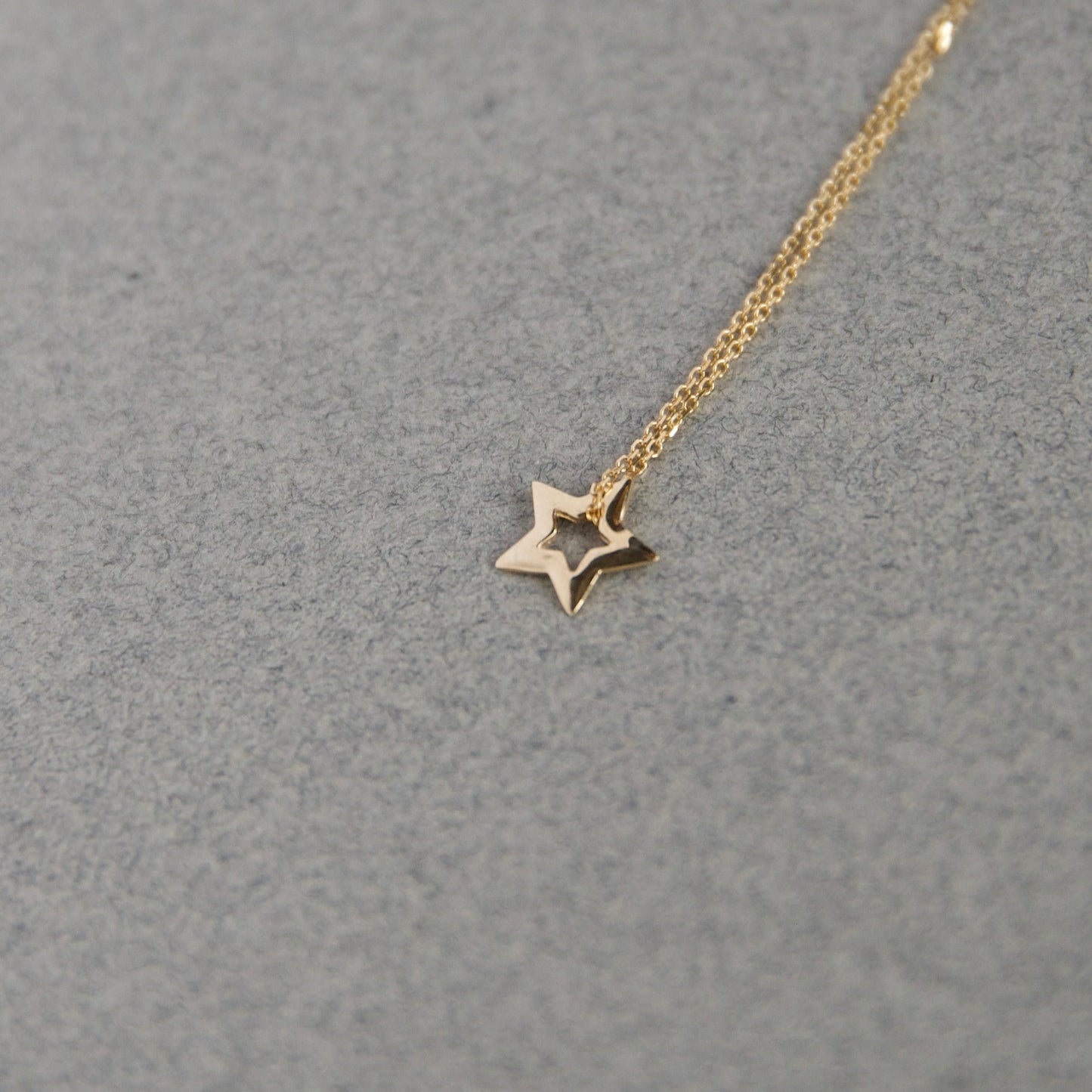 open gold star charm