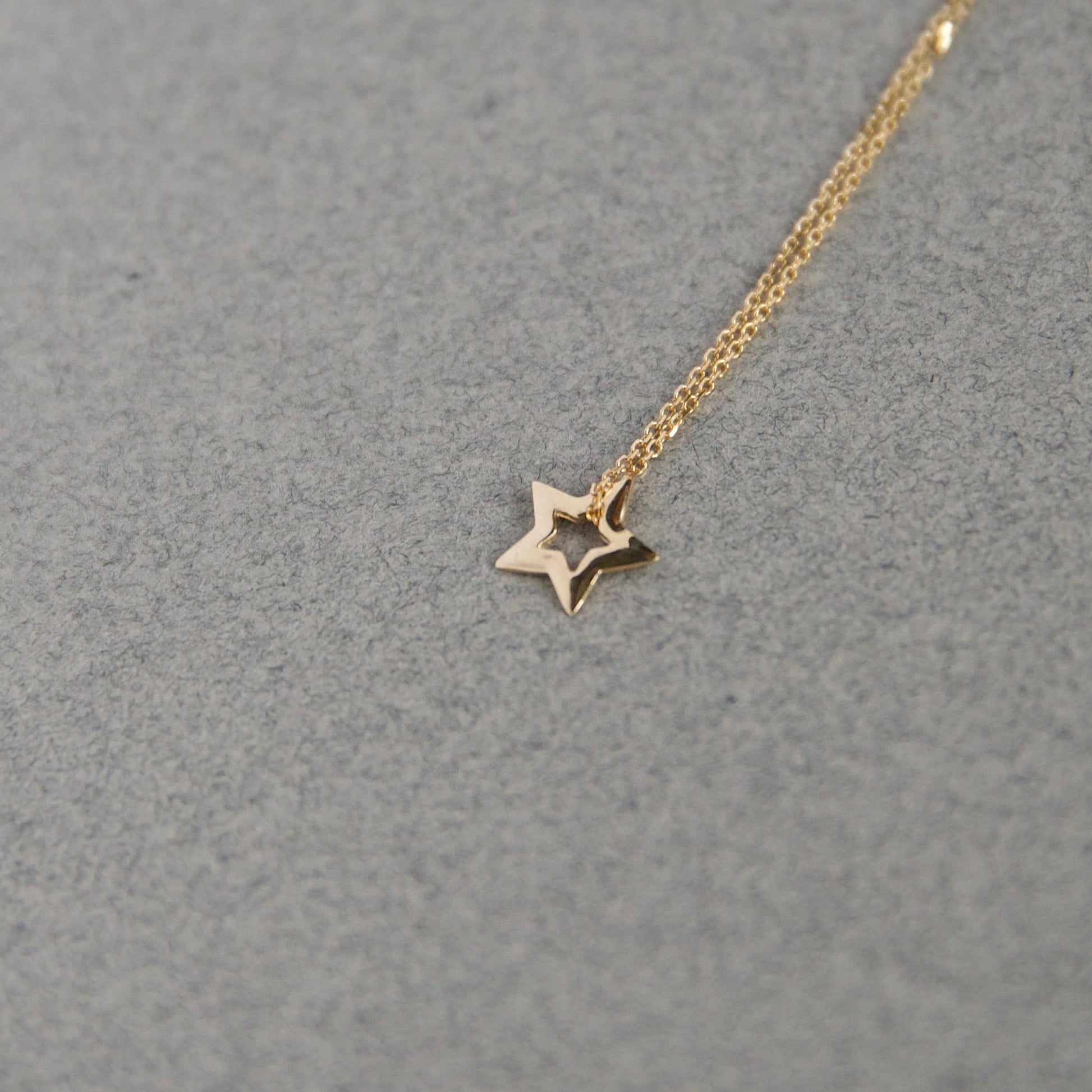 open gold star charm