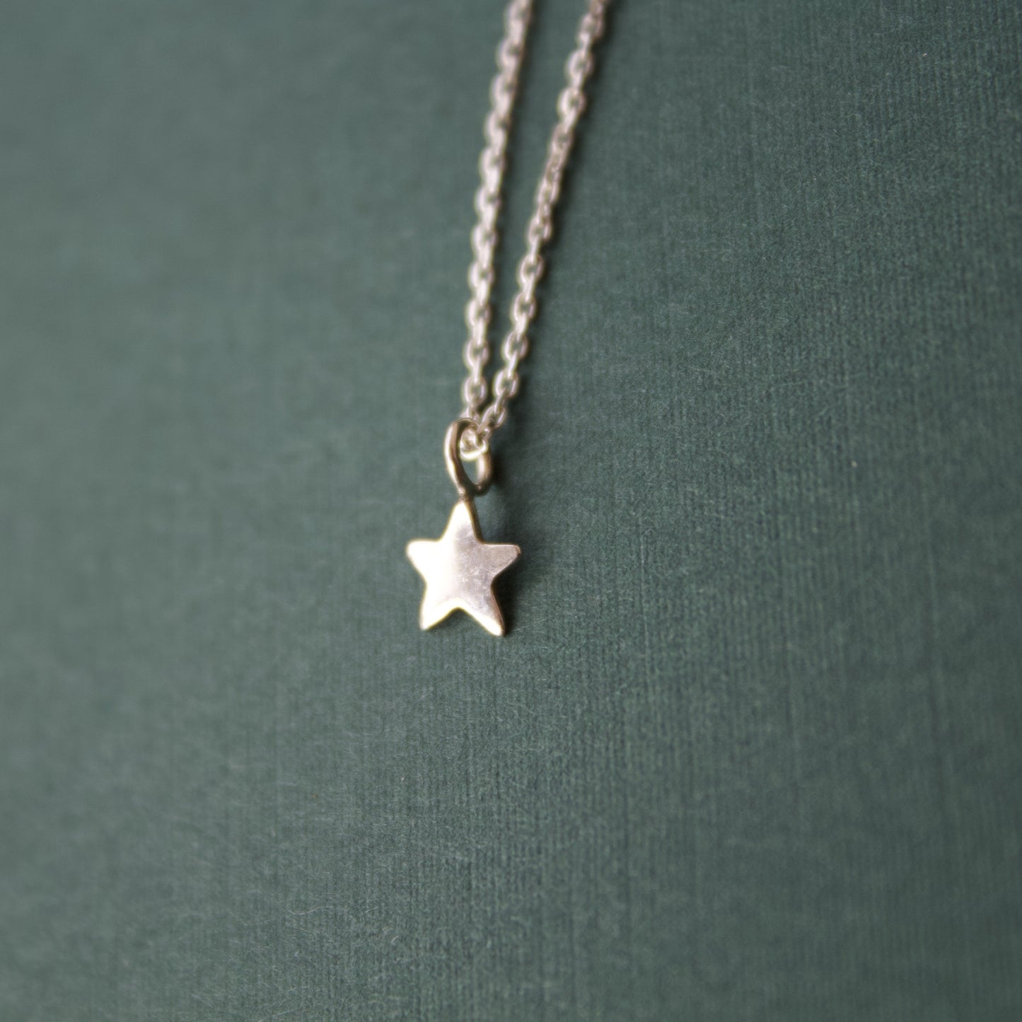 tiny star charm