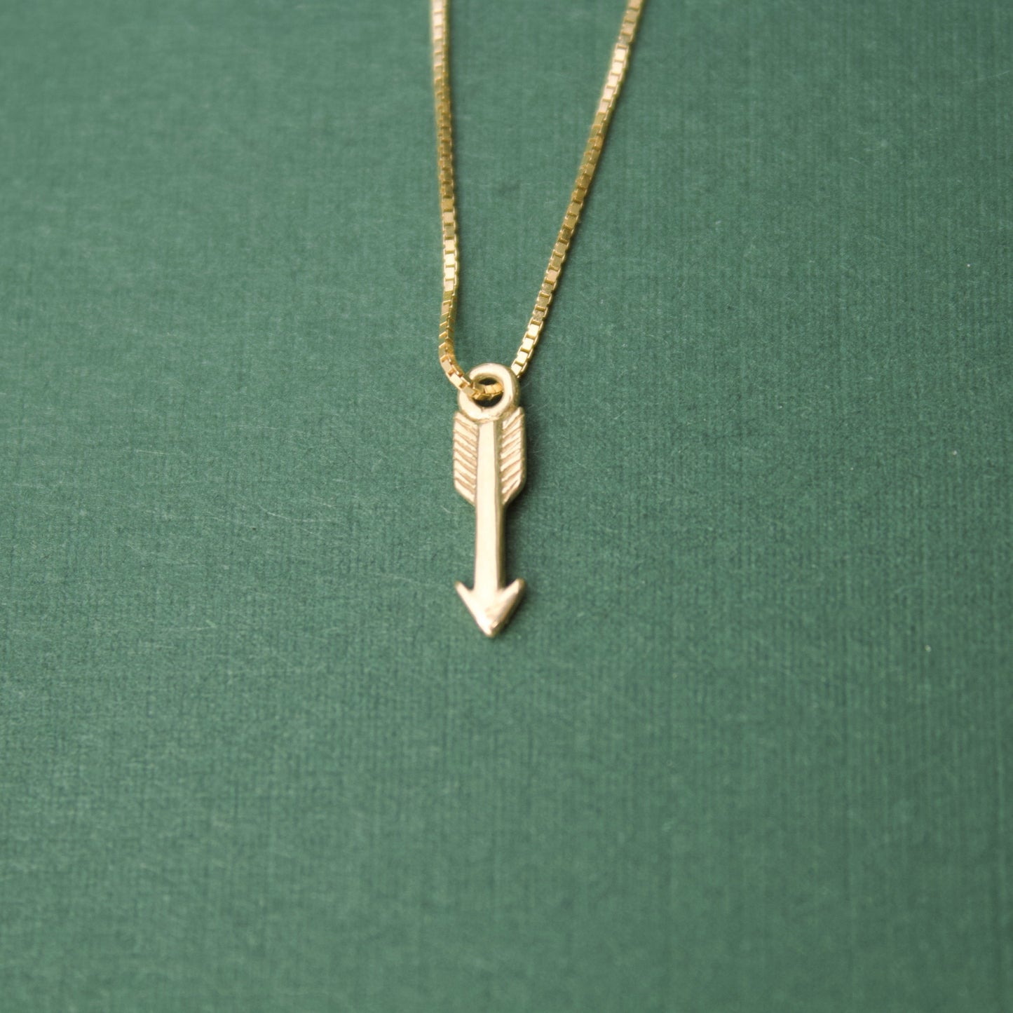 gold arrow charm