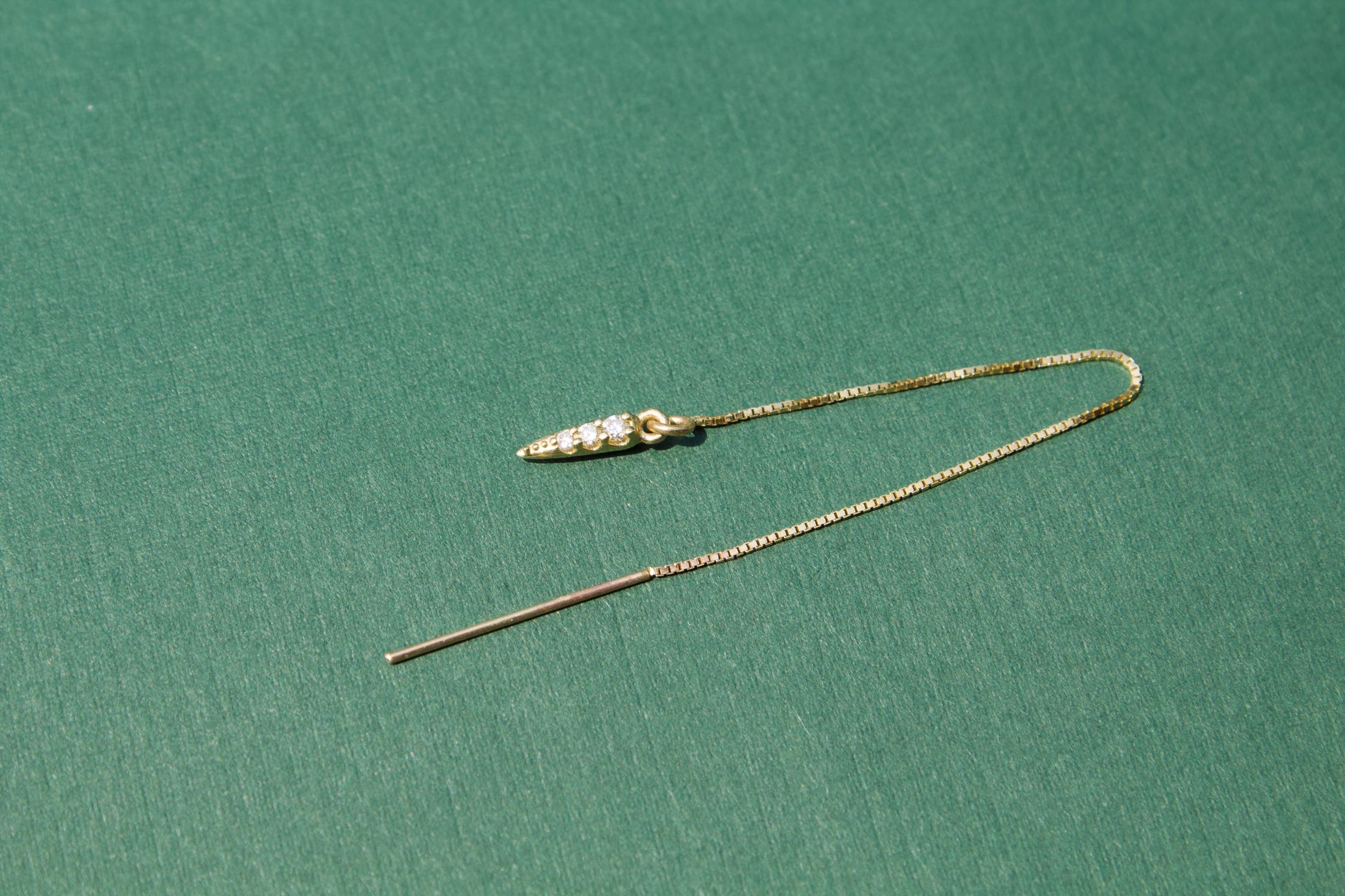 gold diamond spike thread earring